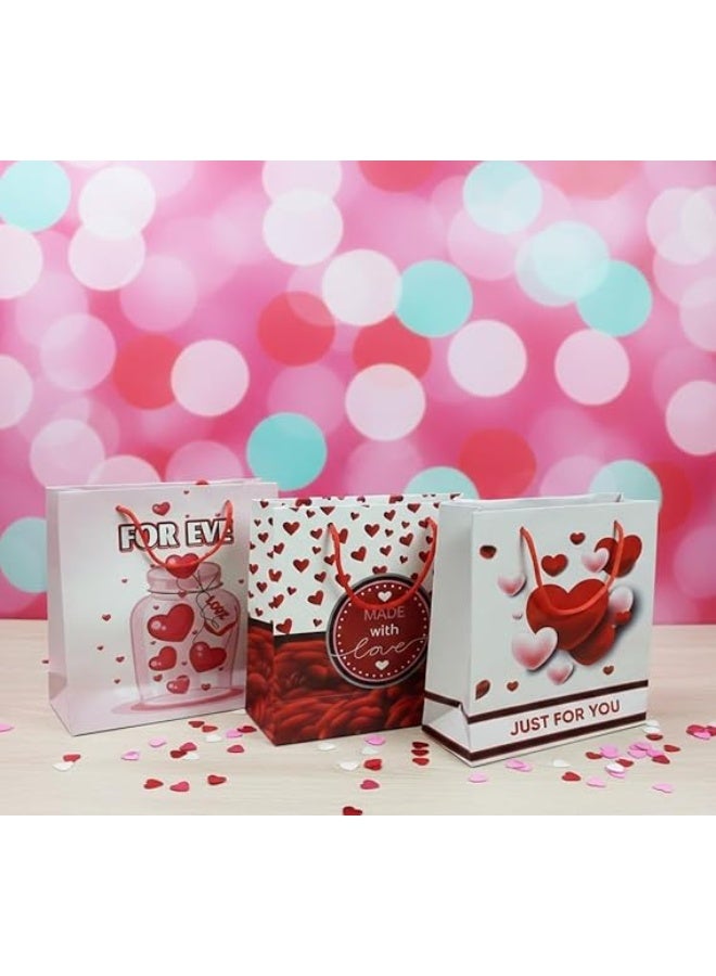 شنطة هدايا أنيقة وعصرية بأشكال مختلفة لجميع المناسبات – تصميم فاخر، متينة وعملية، مثالية لتقديم الهدايا بطريقة راقية وجذابة مقاس 18*18 سم (3 قطع ) - Image 4